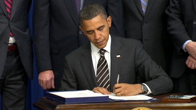 Obama set to sign bill boosting spending on cancer research