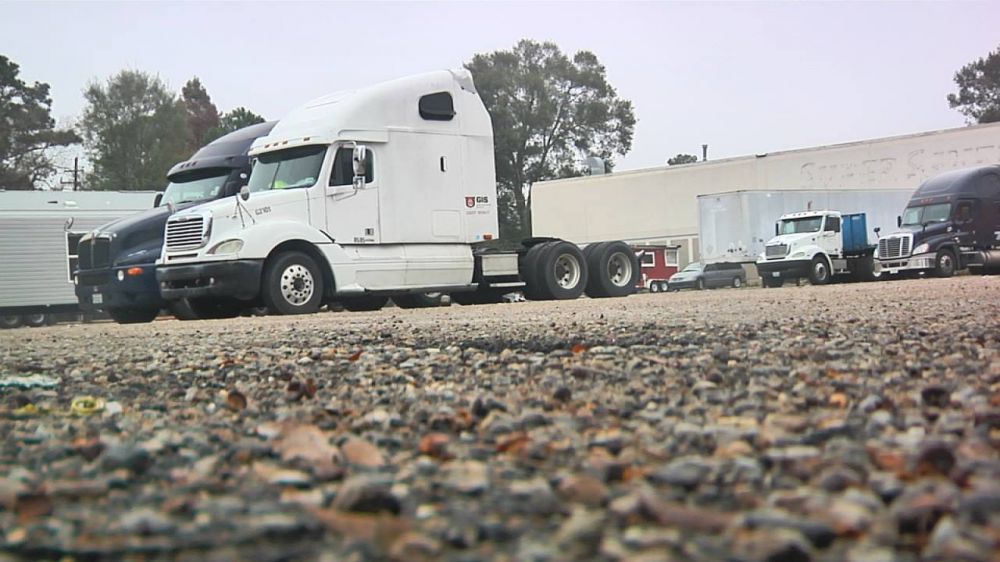 Trucks parking in lot illegally, owners want them gone