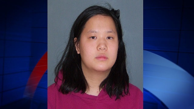Police: Woman charged after throwing child on train tracks
