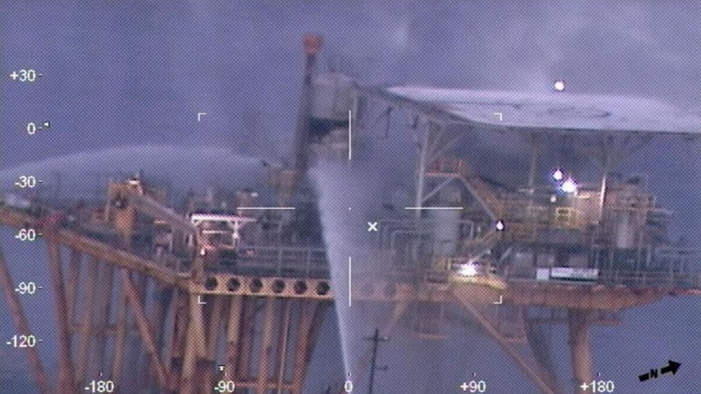 Photos show crews extinguish fire on oil platform in Gulf of Mexico