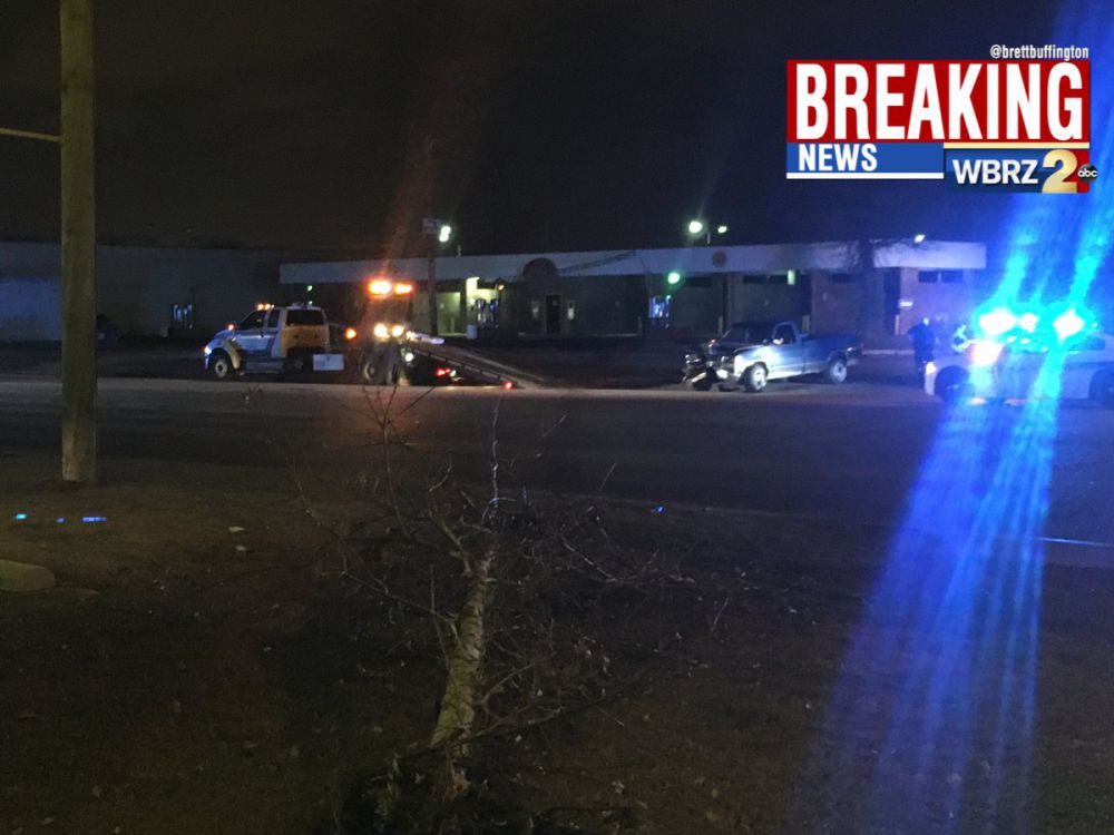 Driver attempts to flee after hitting parked car, car wash building