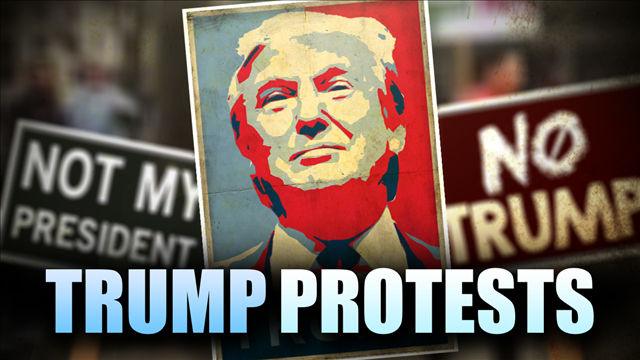 Clinton: Protesters 'marching for our values'