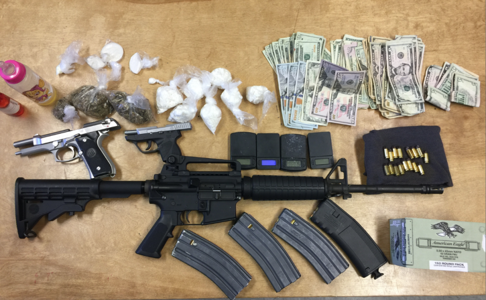 Agents find drugs, weapons in home next to elementary school