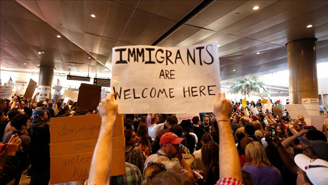 Two states say reinstating travel ban would 'unleash chaos again'