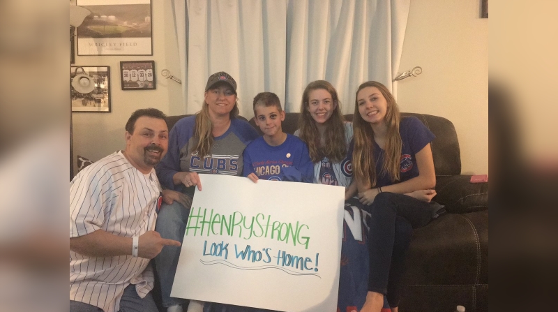 Beaten boy invited to Wrigley by Cubs' Rizzo returns home