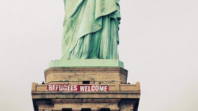 'Refugees Welcome' banner unfurled at Statue of Liberty