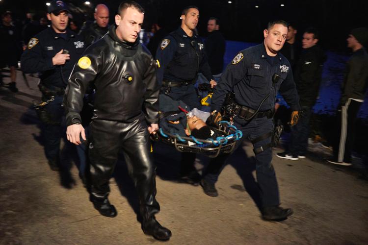 6 teenagers fall through ice into Central Park pond, rescued