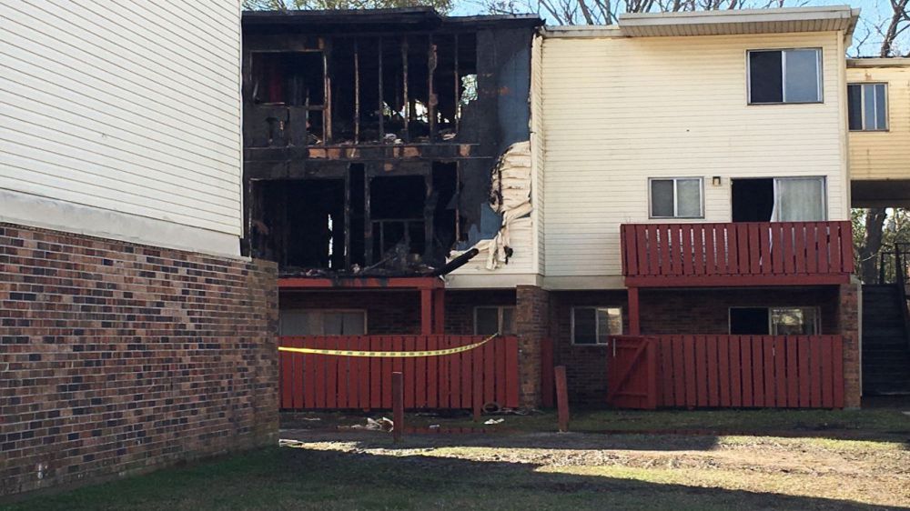State investigators combing through charred apartment complex