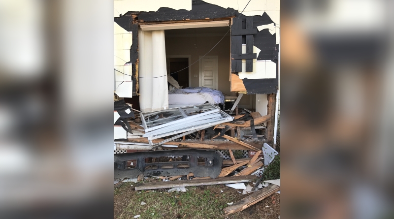 Car plows through bedroom wall, couple just feet away