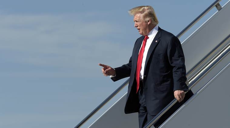 Officials: New Trump order drops Iraq from travel ban list