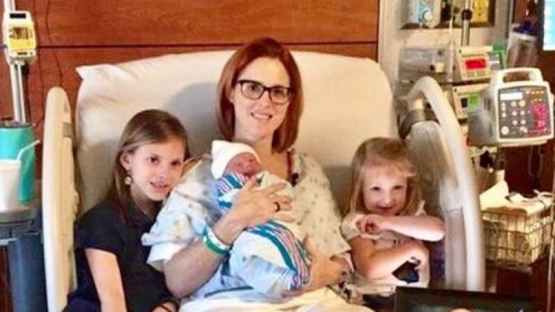 Slain officer's widow gives birth to baby boy