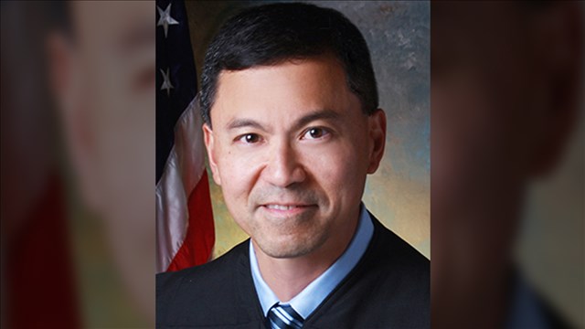 Judge extends order halting travel ban