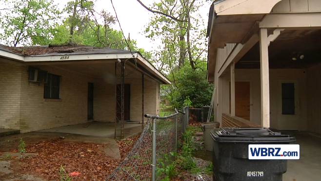 Abandoned next-door property keeps flood victim from returning home