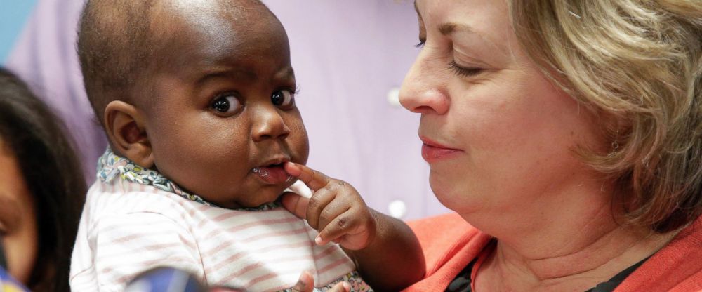 Baby born with extra legs thriving after surgery