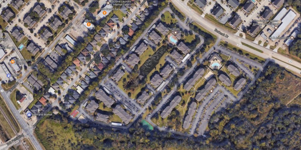 Woman backs car into lake at Burbank apartment complex