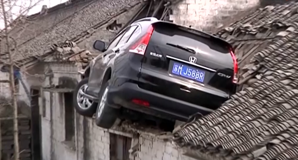 WATCH: Car swerves off road, lands on roof in China