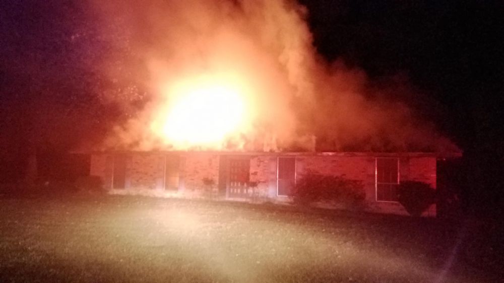 Crews extinguish blaze at flood-damaged home