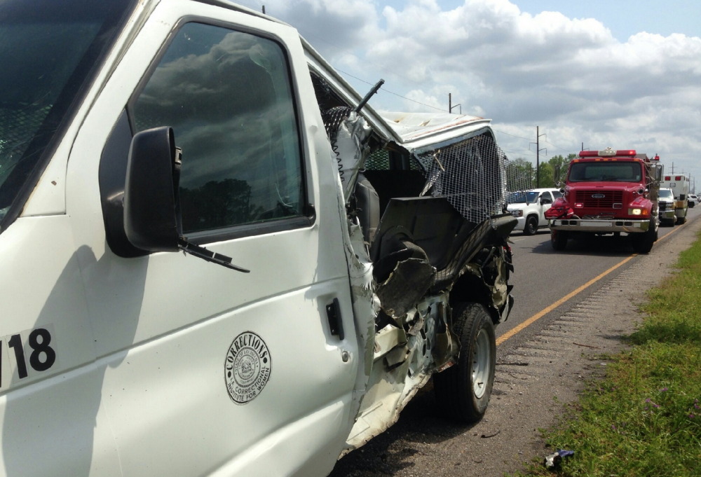 Six hurt in crash involving prisoner transport bus