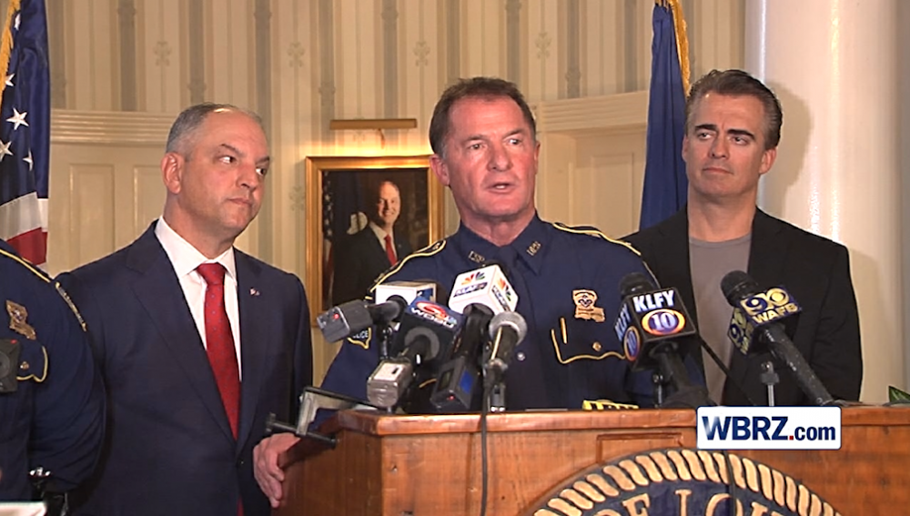 What is La. State Police Col. Mike Edmonson walking away with?