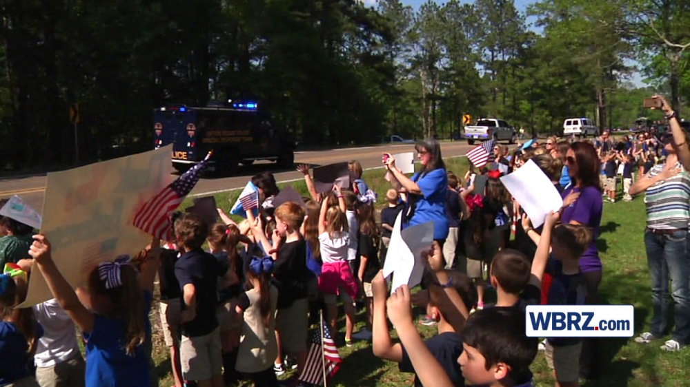 Students, colleagues of deputy's widow pay their respects