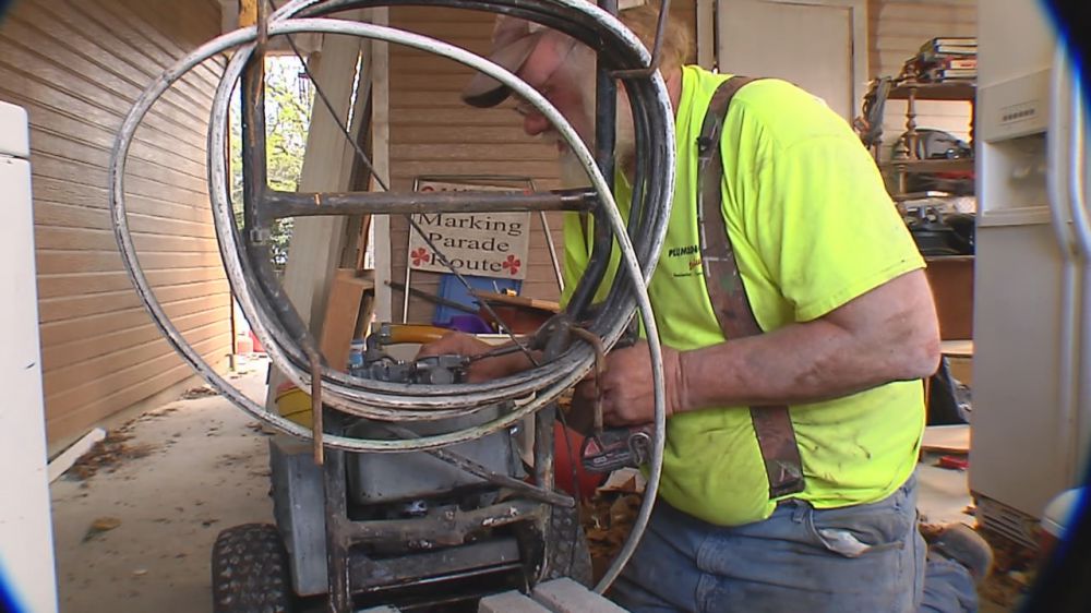 Mother Nature putting a damper on parade painter's plans