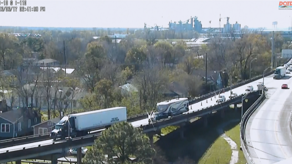 Congestion on I-10 east at the I-10/1-110 due to stalled tractor