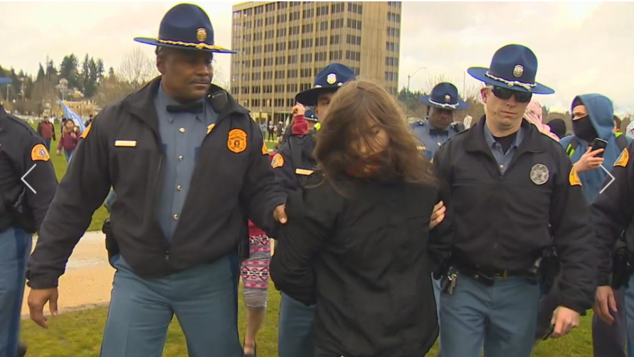 Four arrested at Trump rally in Washington state capital