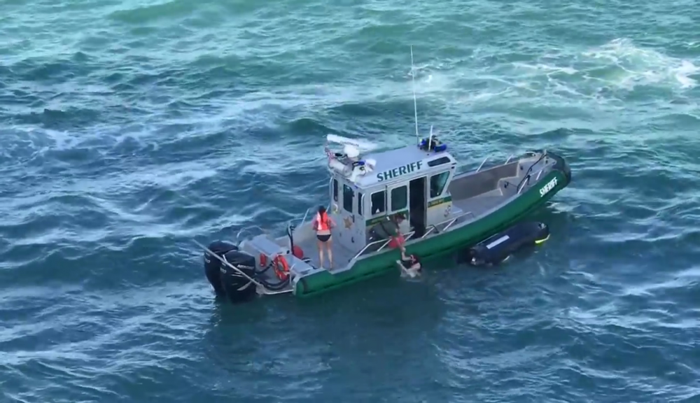 WATCH: Deputy saves jet skiers seconds before cruise ship hits them