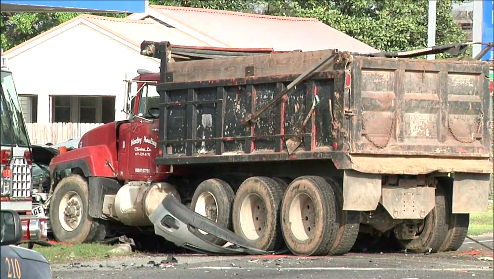 Deadly crash involving several cars, dump truck in Prairieville