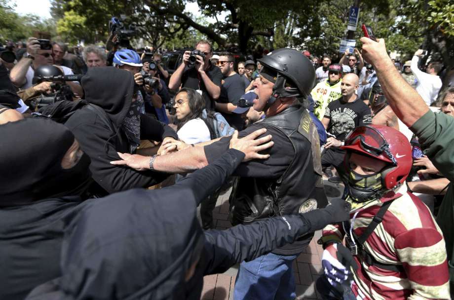 California police seek more suspects after violent rallies