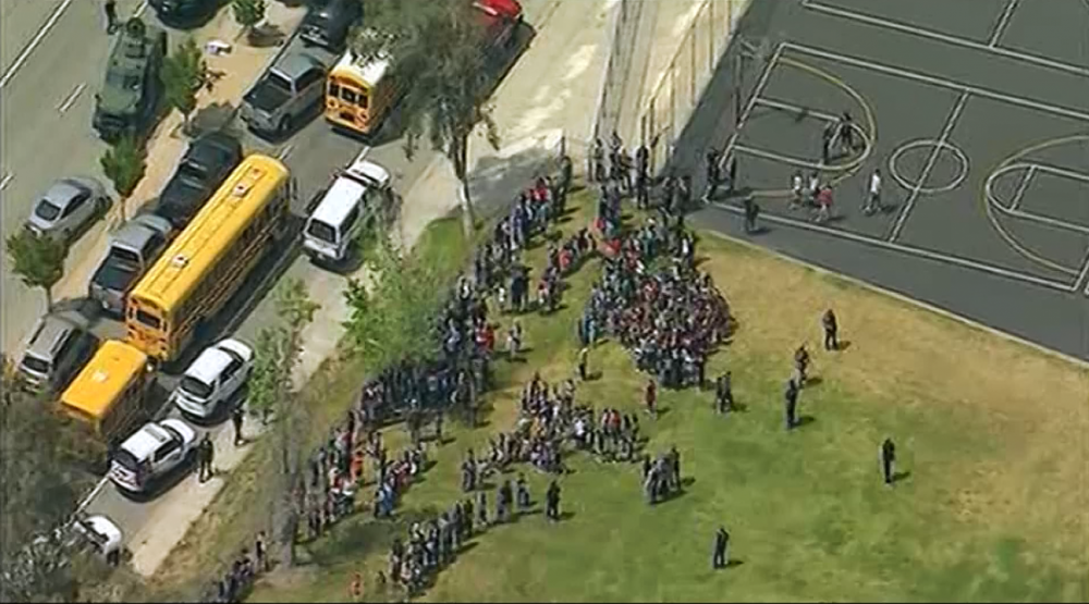Police: 2 adults dead, 2 students hurt in San Bernardino school shooting