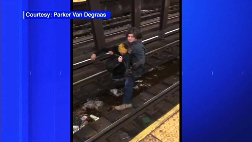WATCH: Utility worker saves man who fell onto NYC subway tracks