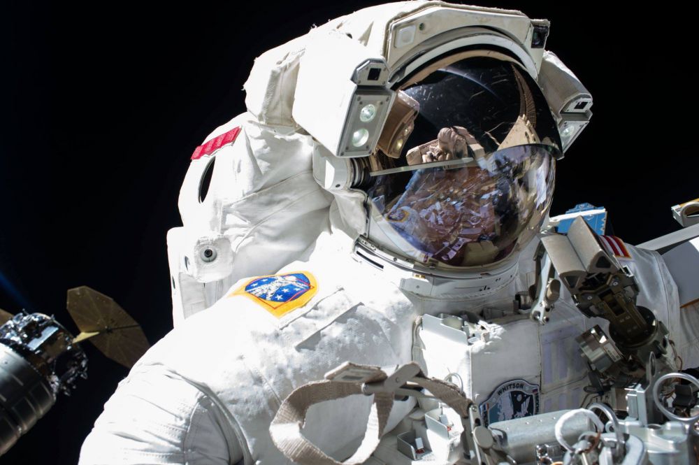 Spacewalking astronauts tackle urgent station repairs