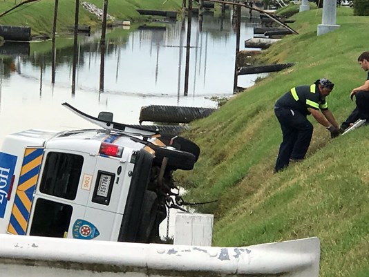Ambulance with wreck victim crashes into Metairie canal
