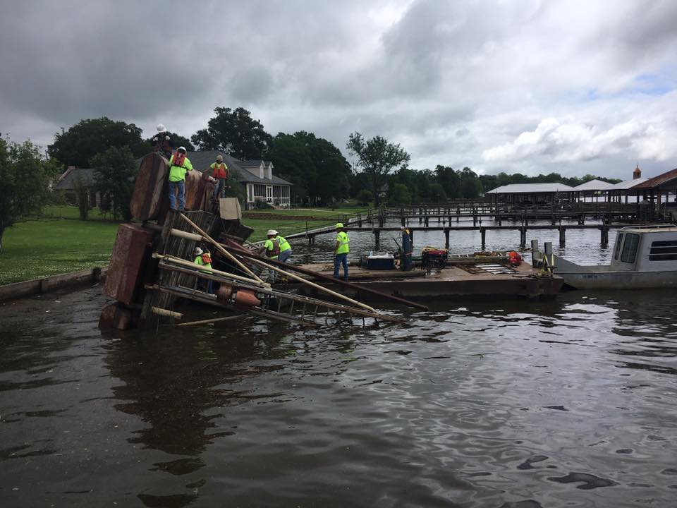 Barge removal started on False River