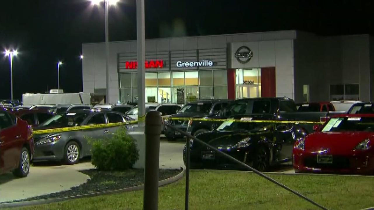 3 killed in shooting after fugitive confronted at Texas car dealership