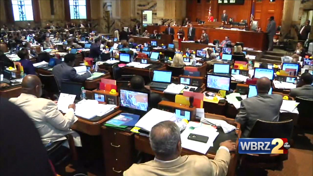 House backs budget reduced from Edwards plan