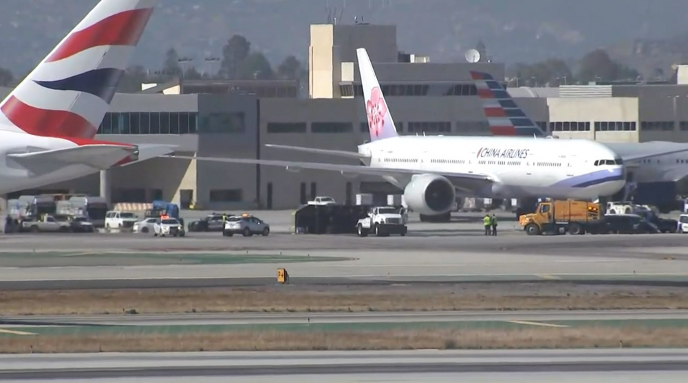 Several injured after plane hits truck on LAX Airport runway