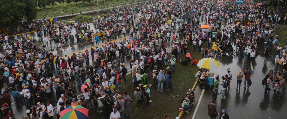 2 dead as Venezuela protests turn violent outside capital