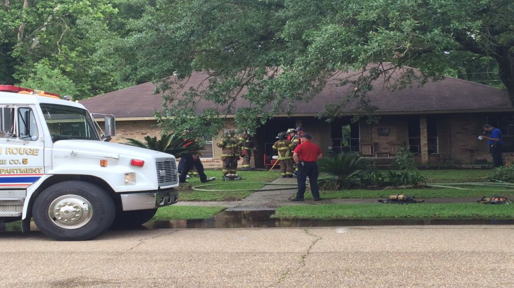 2 escape house fire on Woodglynn Drive