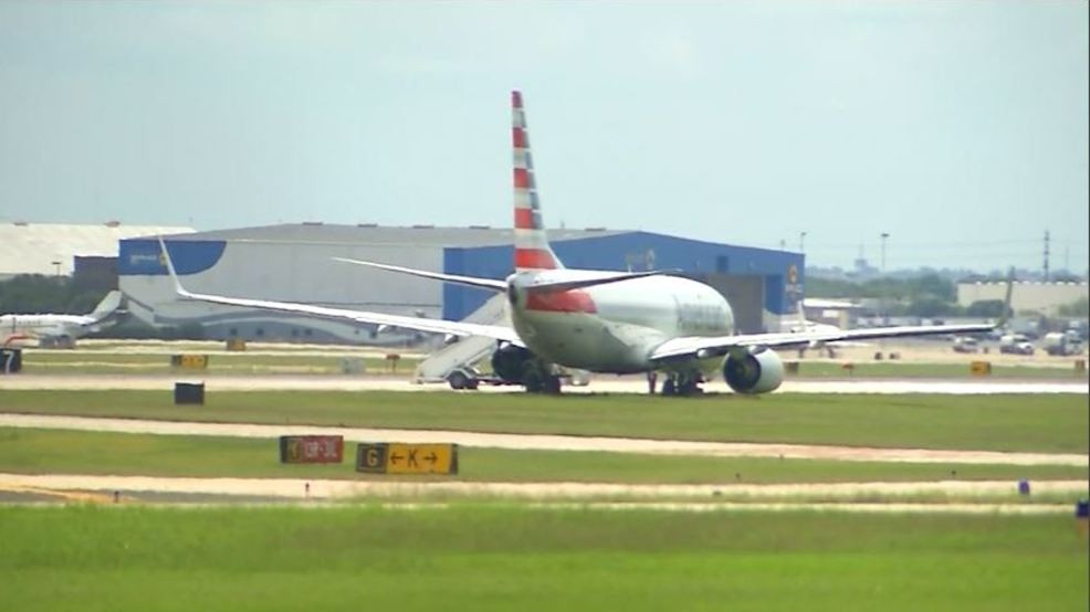 American Airlines jet out of the mud at San Antonio airport
