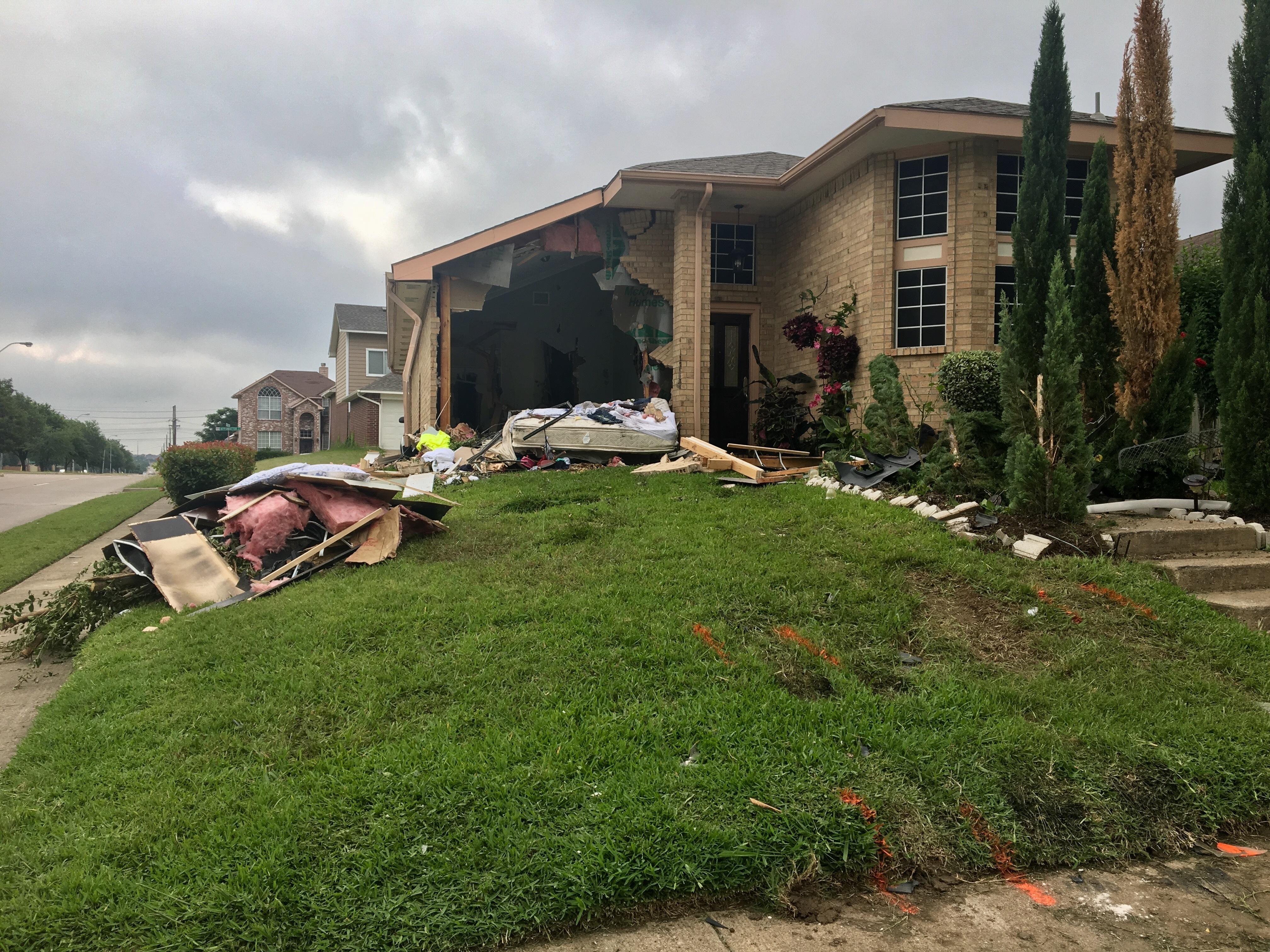 Pickup truck crashes into house, killing 1 in Dallas suburb