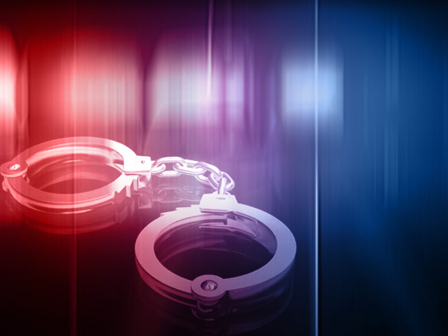 Police officer arrested, accused of trying to set wife afire