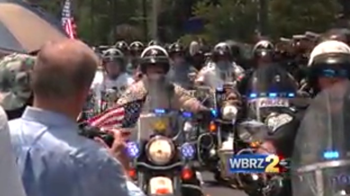 Procession for fallen officer receives huge turnout