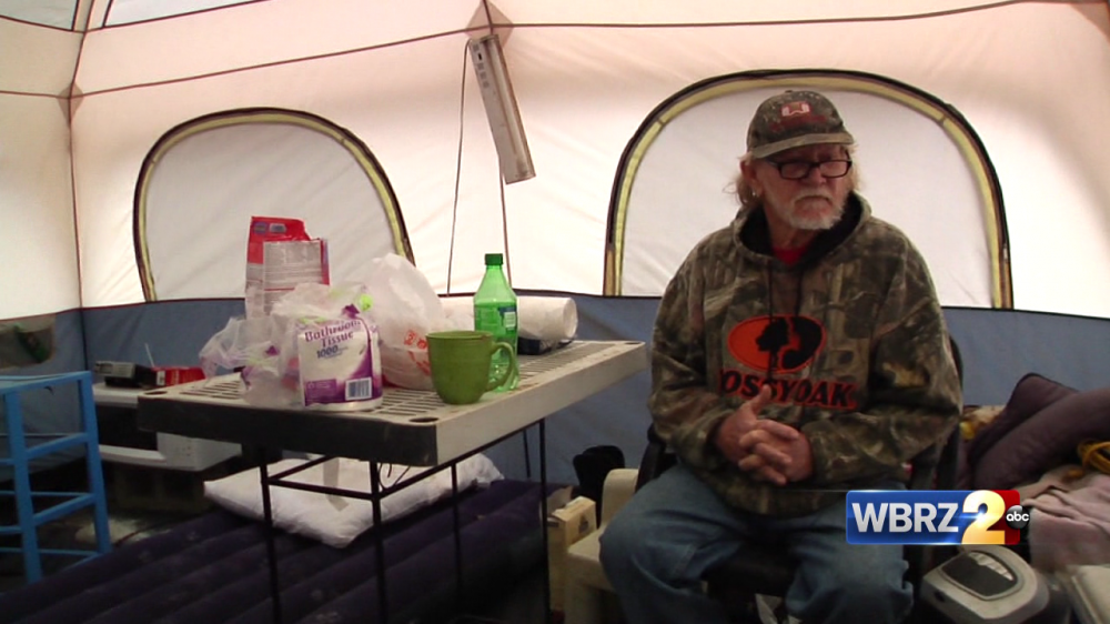 Man living in tent since flood braces for cold weather