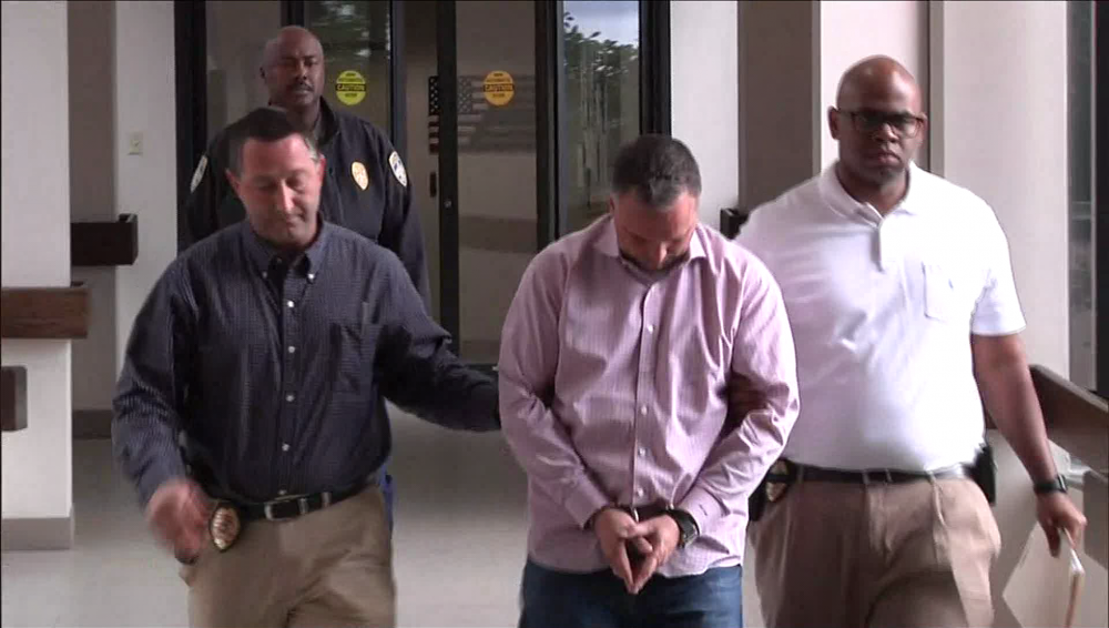 Contractor accused of scamming flood victims booked into Livingston Parish